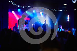 Music Concert background blur. Blurred People dancing with original bokeh lights in background - Defocused image for an