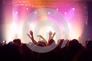 Music concert crowd, people enjoying live rock performance