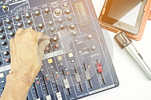 Music equipment,hand on audio mixer