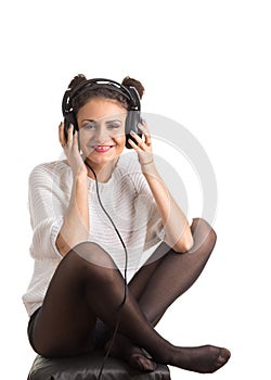 Music fan girl in headphones