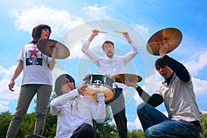 Music group playing in park