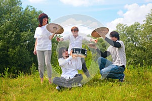 Music group playing in park