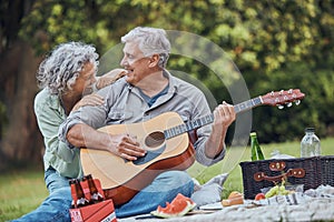 Music, guitar and a senior couple on picnic in park laughing with food, drinks and romance in retirement. Nature, love