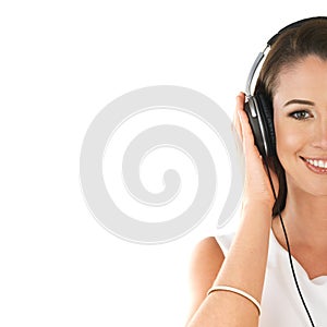 Music, happy woman and half portrait on headphones in studio for streaming and listening to audio isolated on white