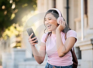 Music, headphones or video call by woman in city for travel, happy and smile on building background. Radio, podcast and