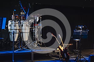 Music instruments on stage in dark studio