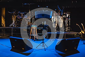 Music instruments on stage in dark studio