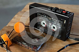 Music listening concept. Vintage cassette tape, audio player and headphones