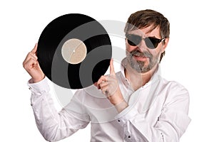 Music lover with an old vinyl disc