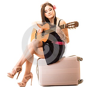 Music lover, summer girl with guitar and suitcase