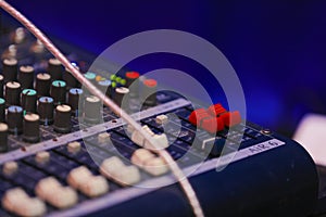Music mixer control panel. Closeup