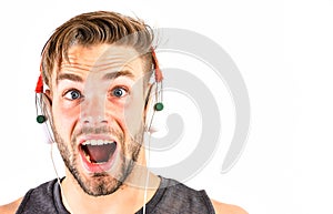 Music is so much fun. ebook and online education. music education. sexy muscular man listen ebook. man in earphones