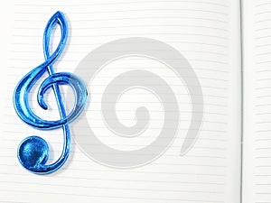 Music note on blank paper background