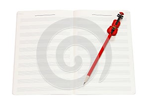 Music note book and red violin pencil with clipping path