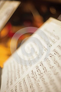 Music note stand with blur orchestra background