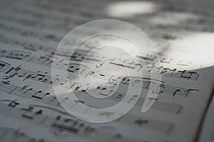 Music notes background: score piano, close up