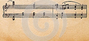 Music notes on old paper sheet