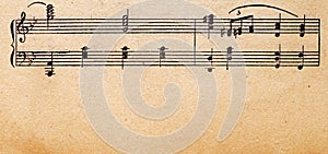 Music notes on old paper sheet