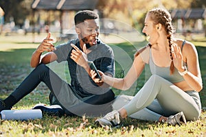 Music, phone and earphone couple in park on fitness run break rap, singing and listen together. Streaming, tech and