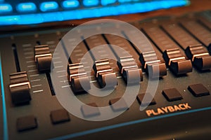 Large Music Mixer desk in recording studio. Closeup