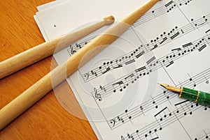 Music score and pen