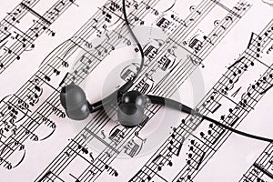 Music sheet with headphones
