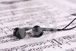 Music sheet with headphones