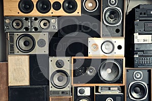 Music sound speakers hanging on the wall in retro vintage style, stacked sound boxes modern