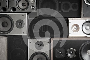 Music sound speakers hanging on the wall in retro vintage style, stacked sound boxes modern