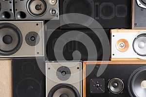 Music sound speakers hanging on the wall in retro vintage style, stacked sound boxes modern