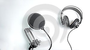 Music studio background. Professional condenser studio microphone on white background.