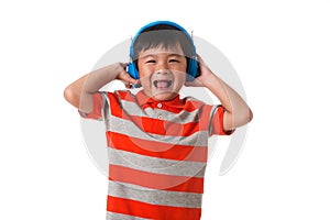 Music and technology concept.Asian little boy with headphone.