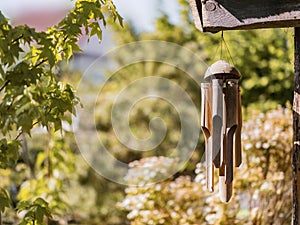 Music of the wind on the roof of a straw hut. Bamboo Wind Chime. Decorating element that produces a pleasant sound