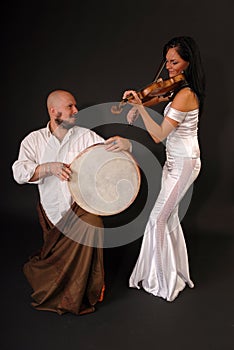Musical duet drum and violin