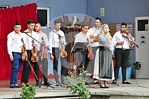 Musical group of instrumentalists in folk costume from Gorj 2