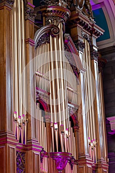 Musical instrument craftsmanship. Ornate vintage pipe organ pipes