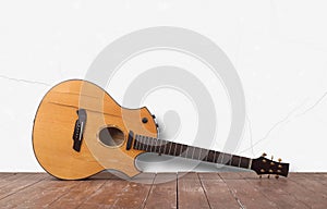 Musical instrument - Front view Broken acoustic guitar white wall