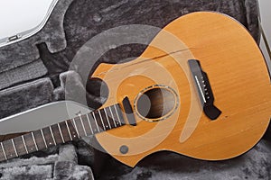 Musical instrument - Front view closeup fragment Broken acoustic guitar