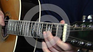 Musical instrument with guitarist hands