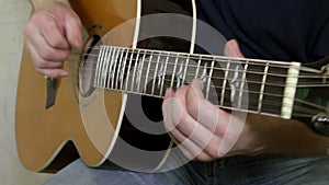 Musical instrument with guitarist hands