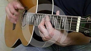 Musical instrument with guitarist hands