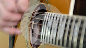 Musical instrument with guitarist hands