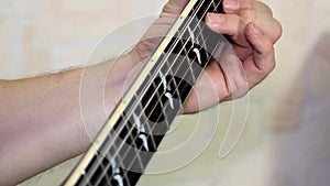 Musical instrument with guitarist hands