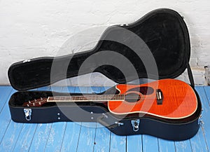 Musical instrument - Orange flame acoustic guitar in hard case