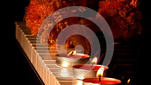 Musical instrument piano candle light and dry flowers