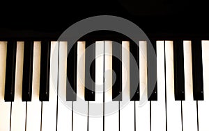 musical instrument, piano keys on black background