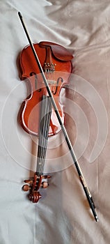 Musical instrument, violin with bow, string instruments,  soft background