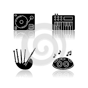 Musical instruments drop shadow black glyph icons set