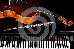 Musical instruments lying on the piano