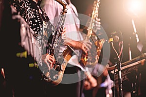 Musical instruments ,Saxophone Player hands Saxophonist playing jazz music.